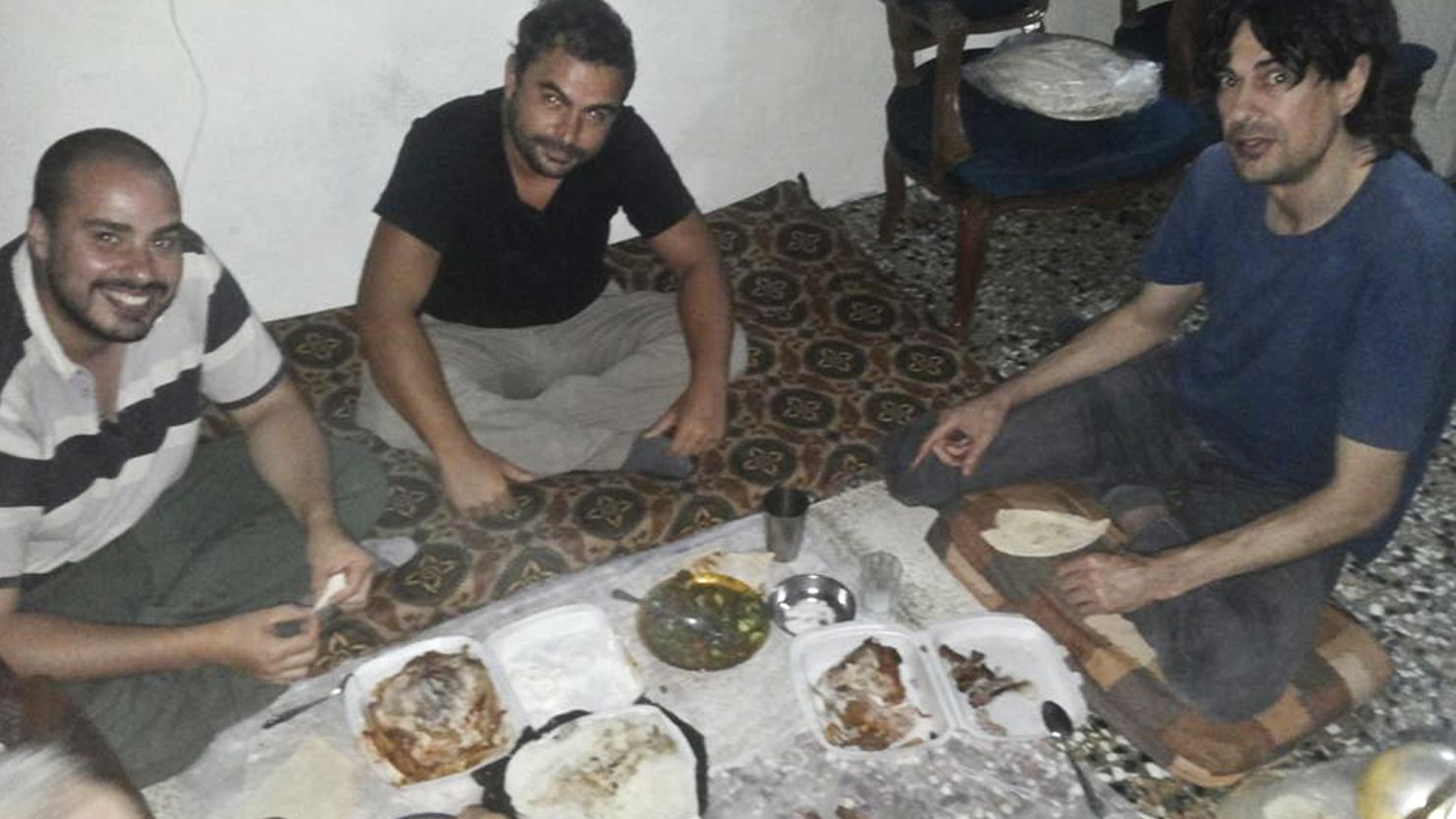 An image posted on Facebook on Saturday, July 11, 2015, shows Spanish freelance journalists Antonio Pampliega, left, Angel Sastre, center, and Jose Manuel Lopez, right, shortly after their arrival in Syria for a reporting trip. 