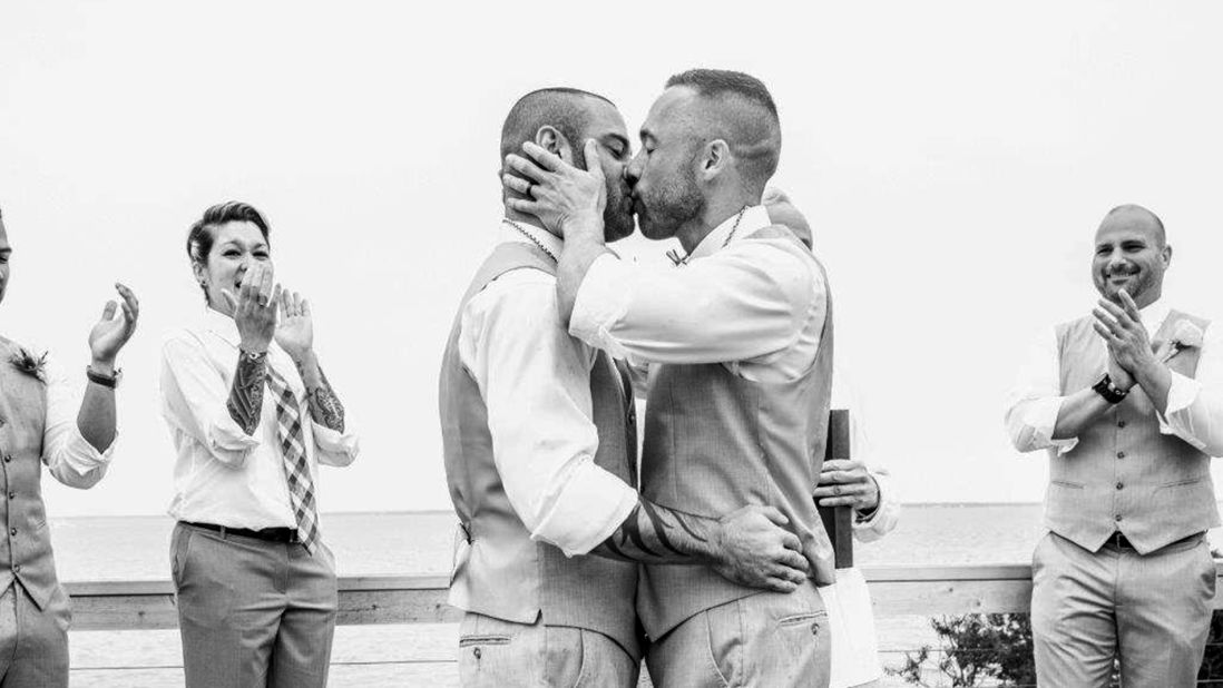 The timing of the Supreme Court ruling could not have been better for Drew Montalvo, left, and Eric Hanser. A year-and-a-half prior, they set their wedding date for June 27, 2015, without the slightest idea of what was to come the day before. Montalvo is an internationally recognized DJ, but he is in the process of being known by a different name. In what he describes as a progressive effort, Montalvo will be taking his husband's last name. They said "I do" on the barrier island of Fire Island Pines in New York, as captured by <a href="http://www.lotusweddings.net/" target="_blank" target="_blank">Lotus Wedding Photography</a>.
