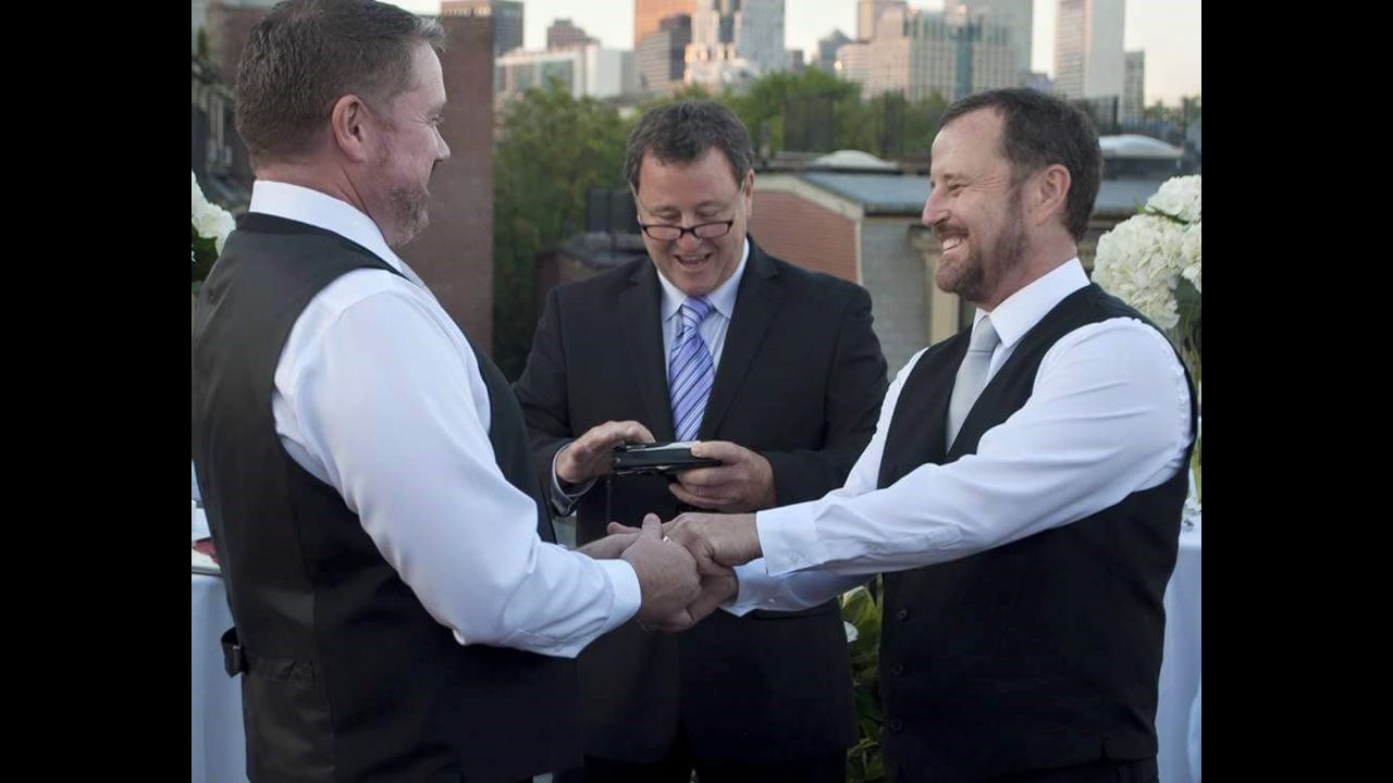 After 13 years together, Greg Smith, left, and Jack O'Leary, right, officially wed in Boston on their anniversary, June 6, 2015. The ceremony was officiated by O'Leary's twin brother Tom O'Leary, center, captured by <a href="http://www.lisasloupe.com/" target="_blank" target="_blank">Lisa's Loupe Photography</a>. After the wedding they took the celebration to Paris where they had a second ceremony during Paris Gay Pride.