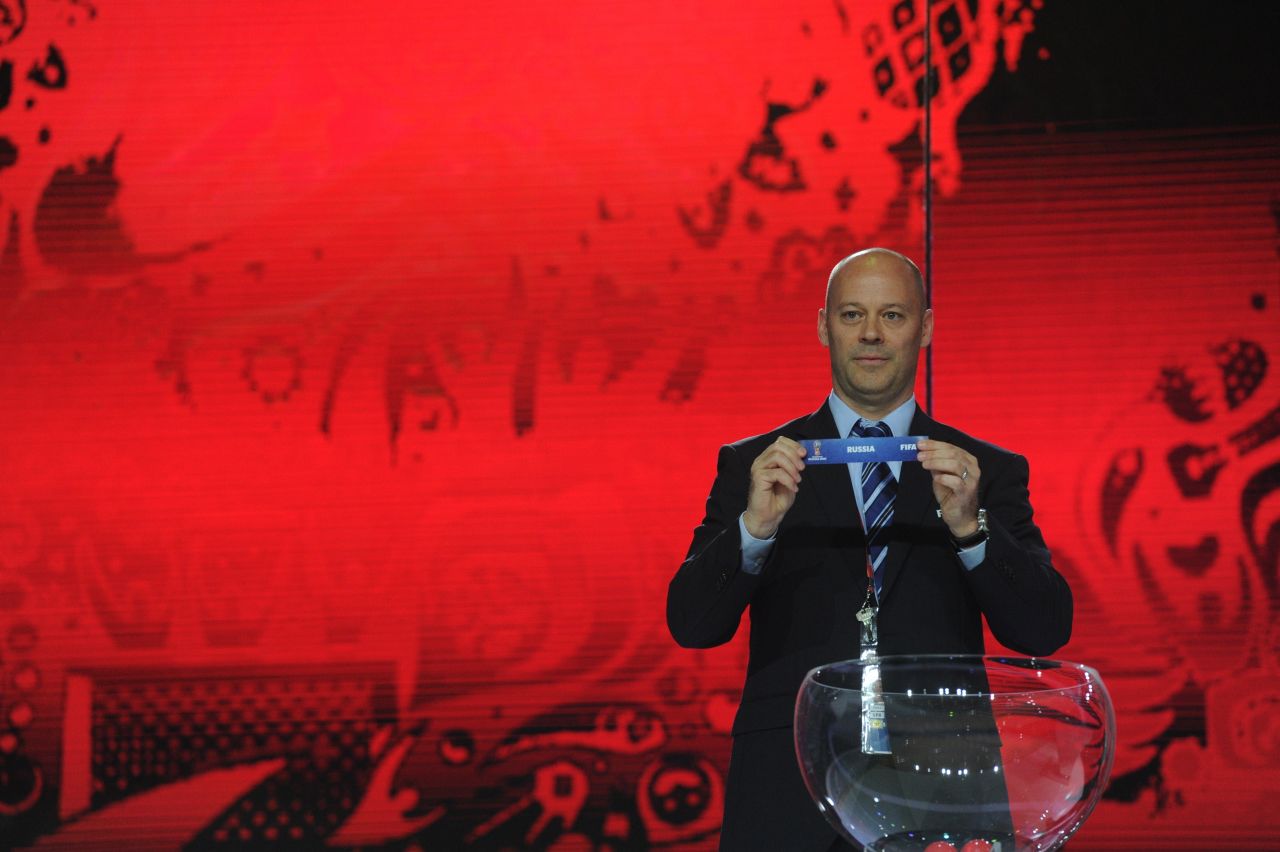 FIFA official Christian Unger plays his part in Saturday's draw. 