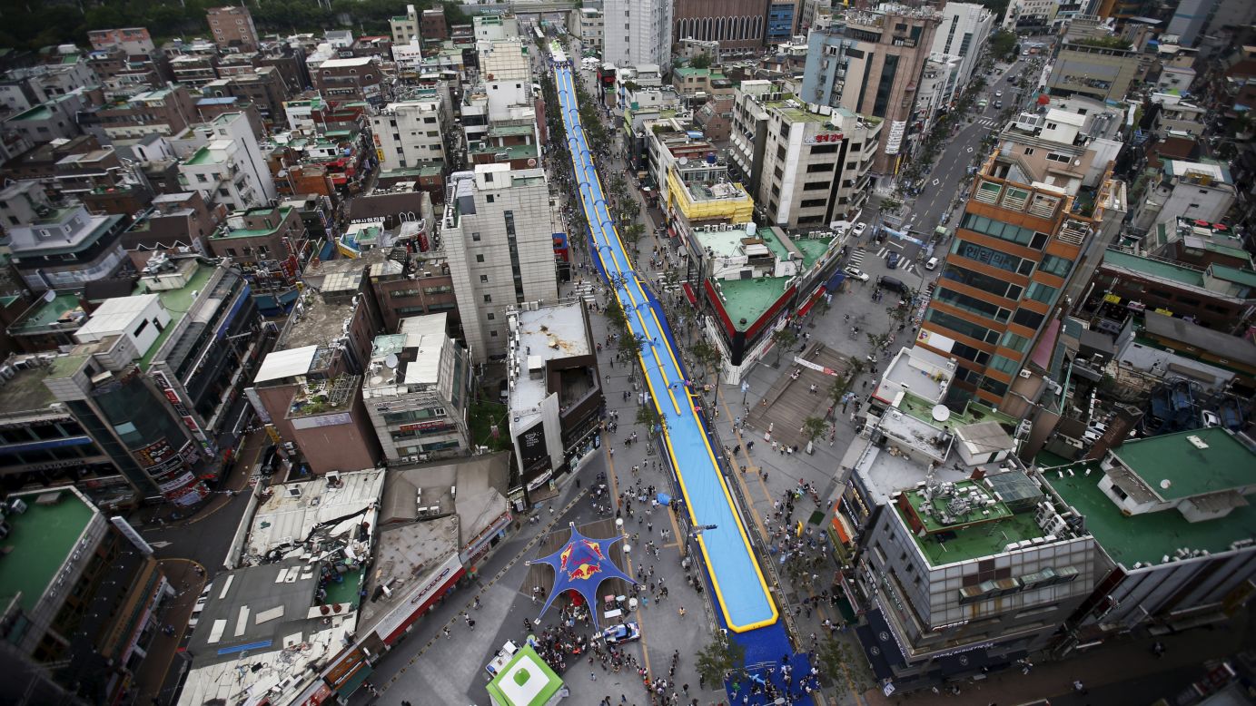 A water slide measuring 1,148 feet stretches through the center of Seoul, South Korea, on Sunday, July 19.