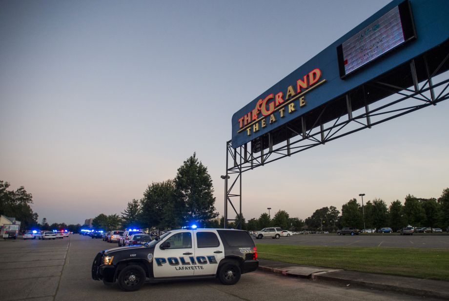 A Lafayette Police Department vehicle blocks an entrance at The Grand Theatre.