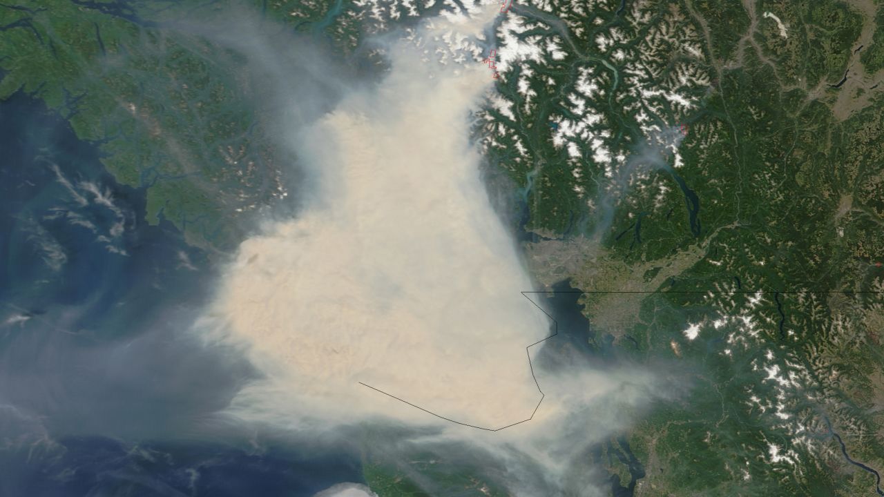 Fires in western Canada sent thick smoke over Vancouver and adjacent areas of British Columbia in early July. Some residents wore face masks for protection and health officials warned Women's World Cup fans against outdoor activities. NASA's Terra satellite captured these images of the smoke July 5 and 6. The smoke almost obscures the Strait of Georgia and southern Vancouver Island. 