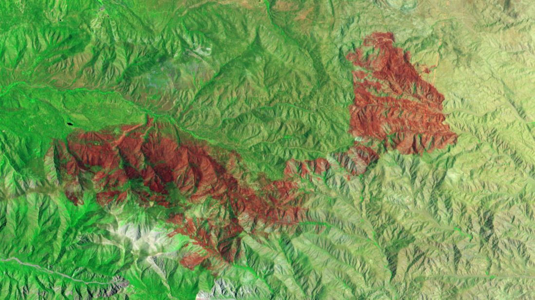 A fire raging in California's San Bernardino National Forest had scorched thousands of acres by early July. NASA's Earth Observing-1 satellite took this false-color image of a burned area spanning 49 square miles (127 square kilometers) on July 3. The burned areas appear dark red because they're reflecting shortwave infrared light.