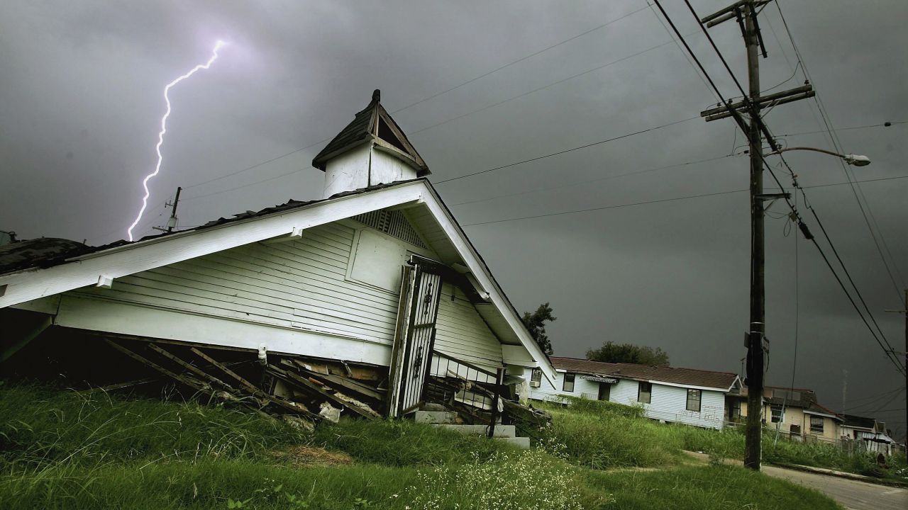 A lightning bolt strikes above a destroyed church in the Lower Ninth Ward on August 5, 2006. Dozens of churches were destroyed by Hurricane Katrina.