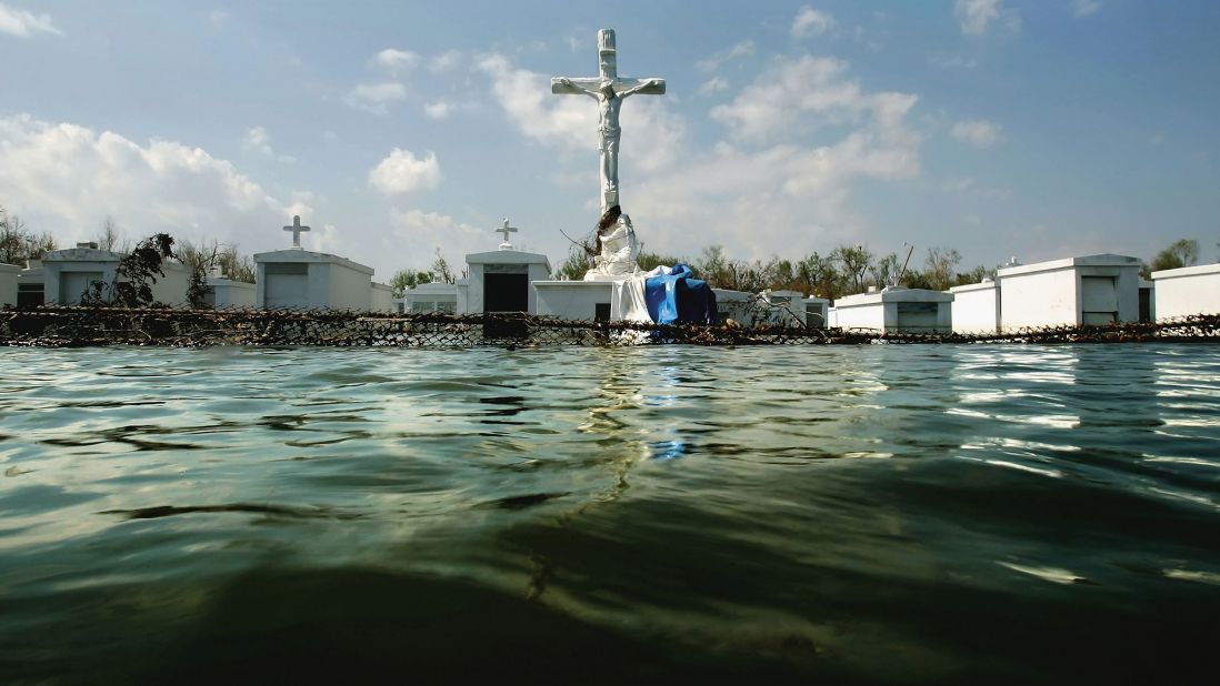 Water floods a cemetery outside St. Patrick's Church in Plaquemines Parish, Louisiana, on September 11, 2005.