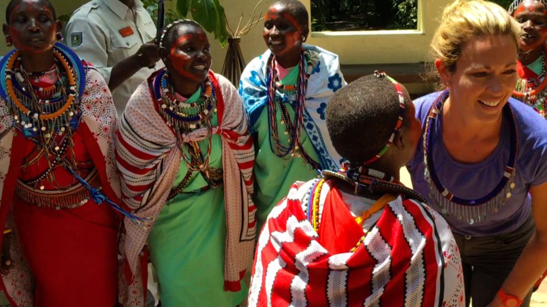 Maasai women from a neighboring village greeted Brooke and Lindsay at Sanctuary Olonana with traditional songs.
