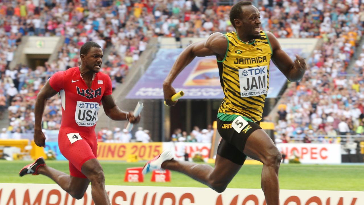 Jamaica's Usain Bolt (R) and US Justin Gatlin compete during the men's 4x100 metres relay final at the 2013 IAAF World Championships at the Luzhniki stadium in Moscow on August 18, 2013. AFP PHOTO / ALEXANDER NEMENOV (Photo credit should read ALEXANDER NEMENOV/AFP/Getty Images)