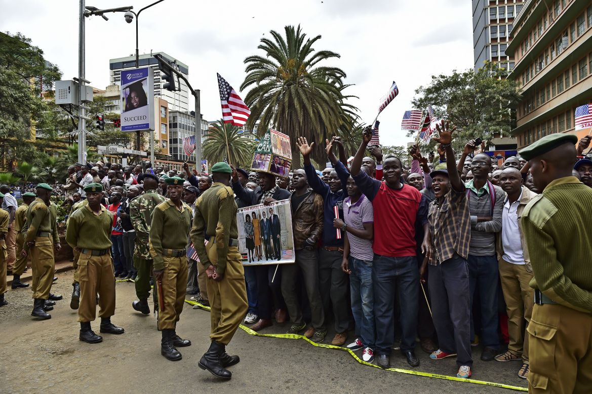 Crowds gather near Memorial Park in Nairobi to cheer Obama's motorcade on July 25.