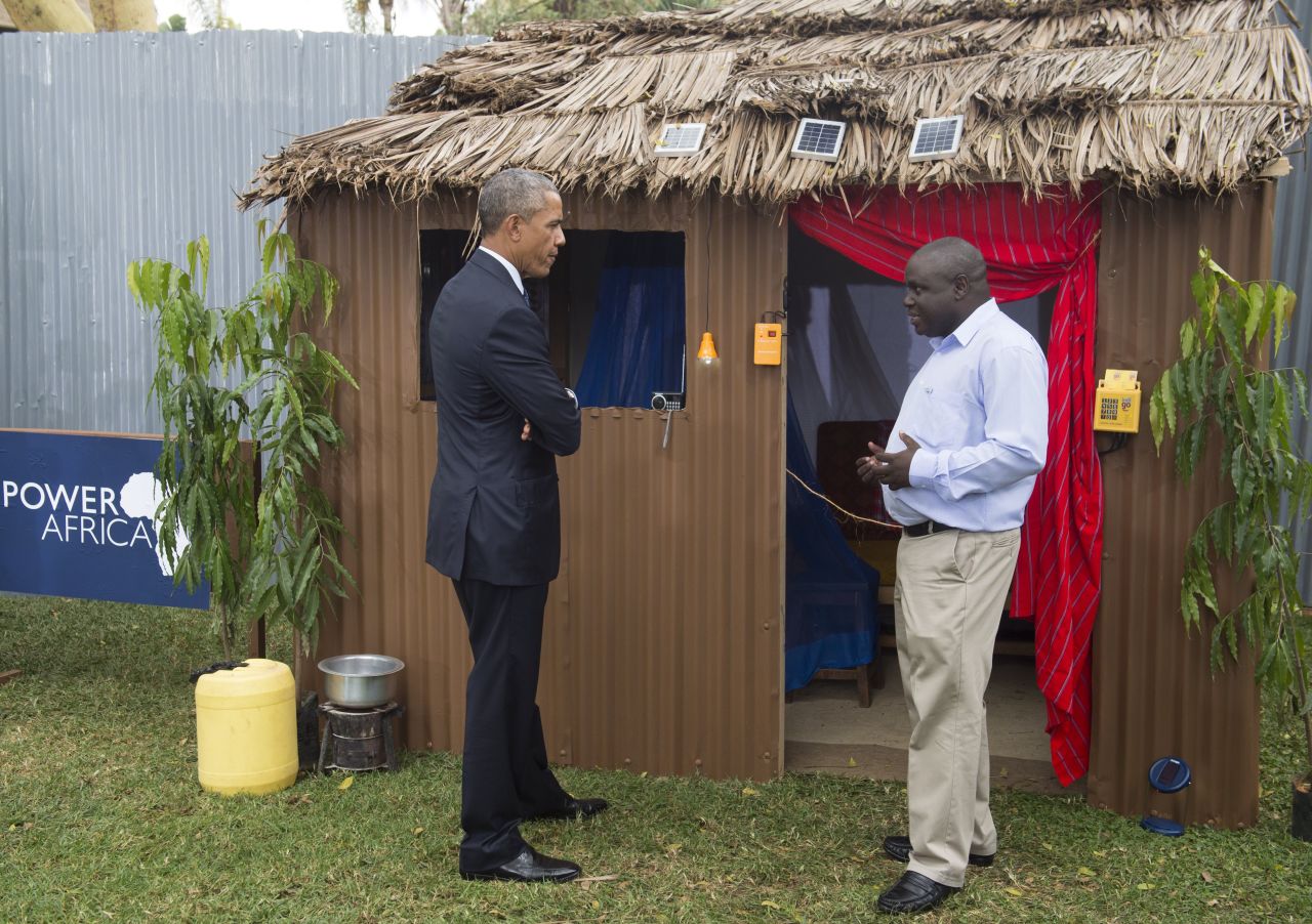 Obama talks with Michael Wanyonyi, CEO and founder of Mibawa Suppliers, on July 25 as he visits the Power Africa Innovation Fair, an initiative to increase the number of people with access to electricity in sub-Saharan Africa.