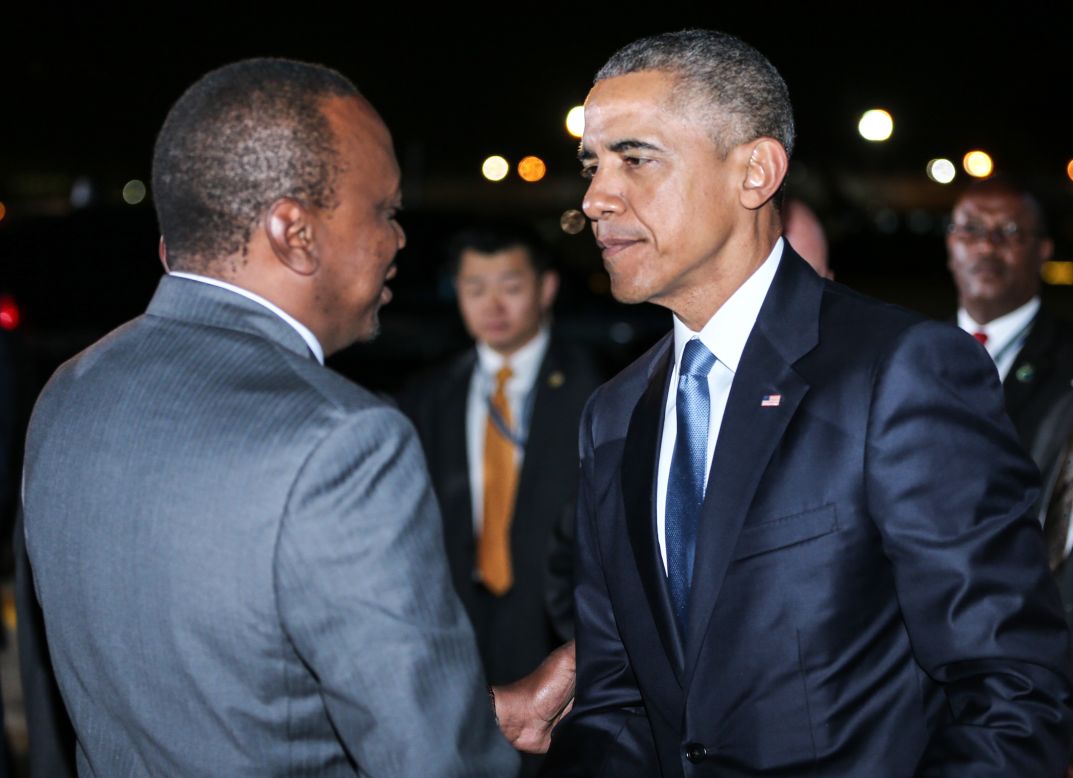 Obama greets Kenyatta on July 24.