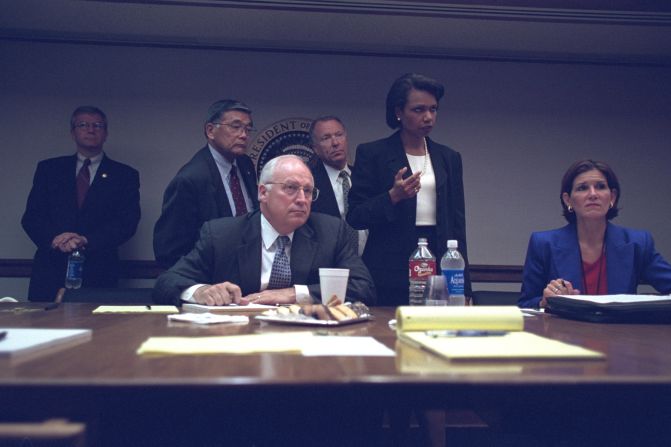 Cheney with members of the White House staff, including National Security Adviser Condoleezza Rice. "Frontline" said Friday's release of photos was the second set requested by Hanna. That first set shows other behind-the-scenes photos of Bush and Cheney.