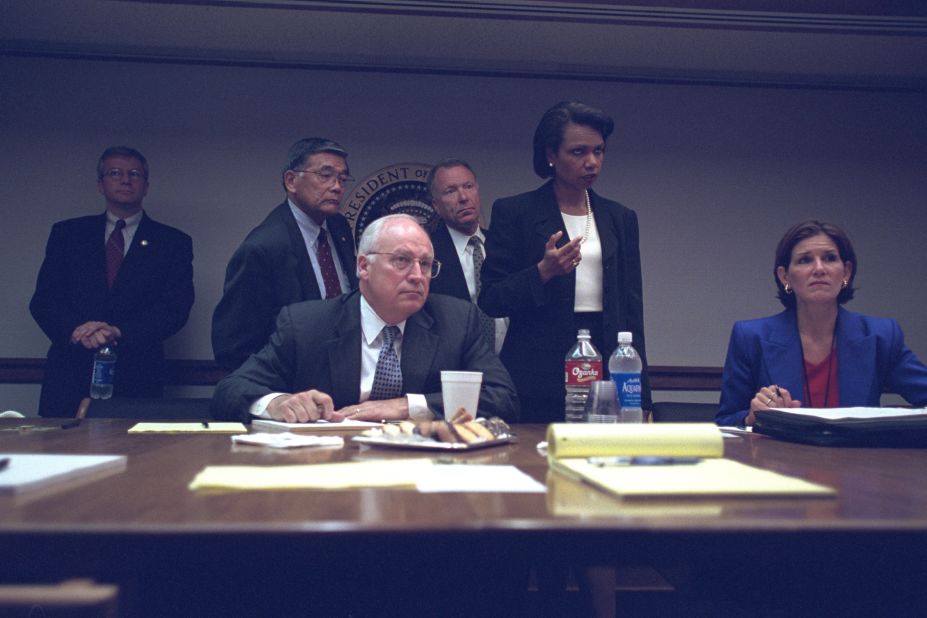 Cheney with members of the White House staff, including National Security Adviser Condoleezza Rice. "Frontline" said Friday's release of photos was the second set requested by Hanna. That first set shows other behind-the-scenes photos of Bush and Cheney.