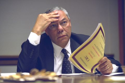 Secretary of State Colin Powell looks over a report. All of the released photos are available in a National Archives <a href="https://www.flickr.com/photos/usnationalarchives/sets/72157656213196901" target="_blank" target="_blank">Flickr album</a>.