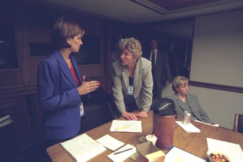 Mary Matalin talks with Karen Hughes, counselor to the President, near Lynne Cheney in the President's Emergency Operations Center.