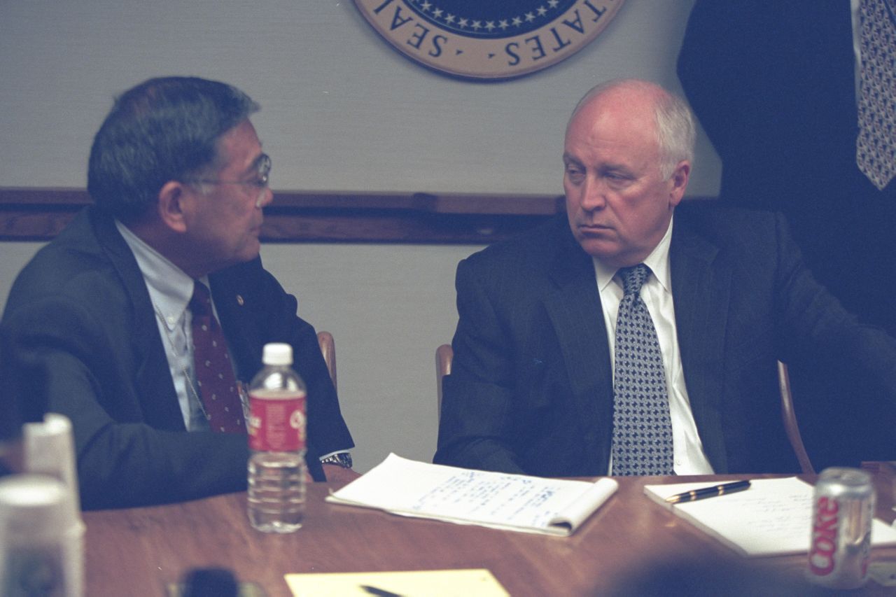 Cheney talks with Secretary of Transportation Norman Mineta.