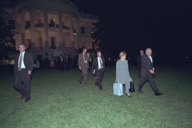 The Cheneys depart the White House and prepare to board Marine Two. He later took a nighttime ride past the heavily damaged Pentagon. "I recall watching the vice president, who was staring out the window at the Pentagon, and wondering what he may be thinking about, the responsibilities he would have in the future. A pretty sobering moment," said Libby, his chief of staff.