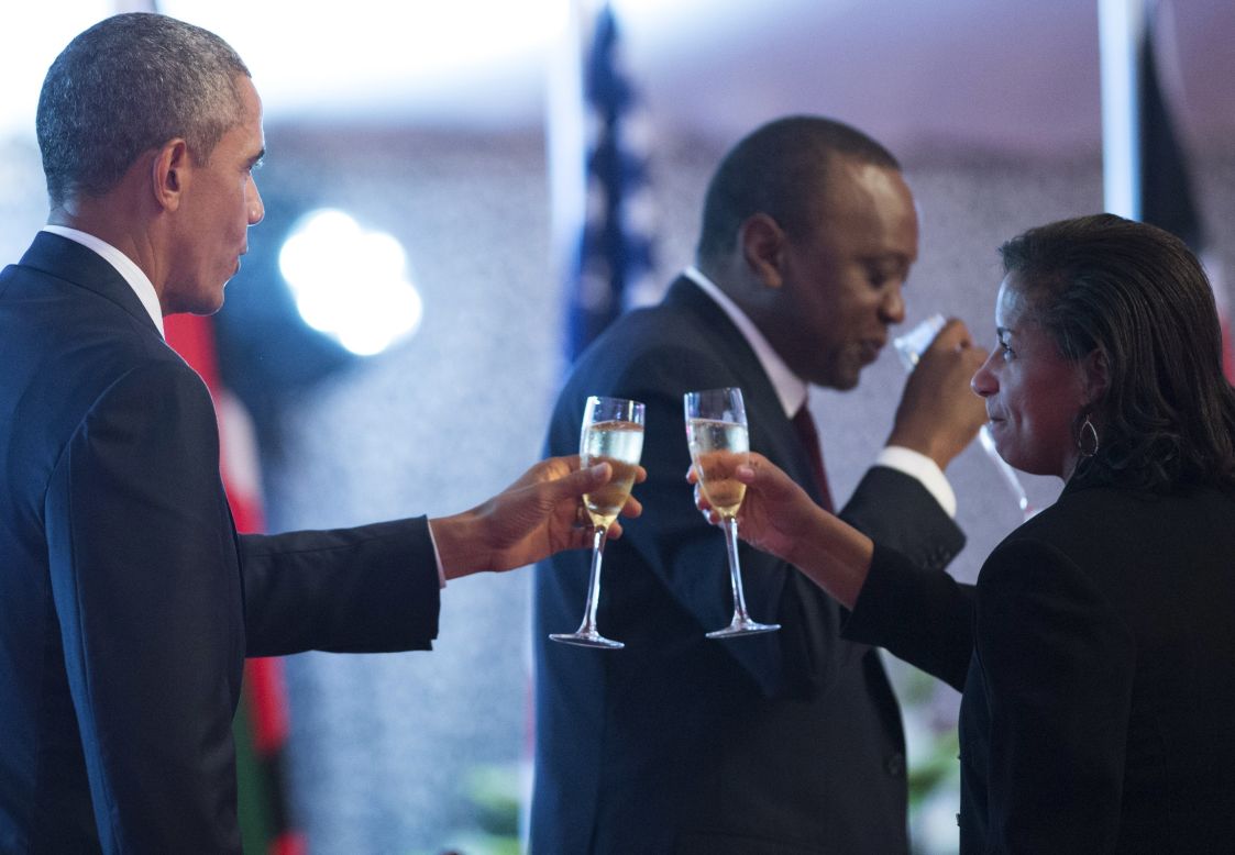 Obama and national security adviser Susan Rice share a toast during a state dinner in Nairobi on Saturday, July 25.  