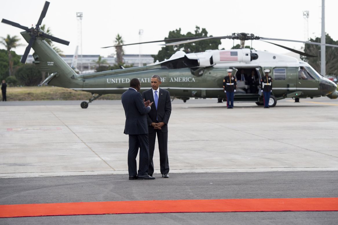 Obama talks with Kenyan President Uhuru Kenyatta in front of Marine One in Nairobi on July 26. The U.S. President called on Kenya's leaders to reject ethnic divisions and government corruption.