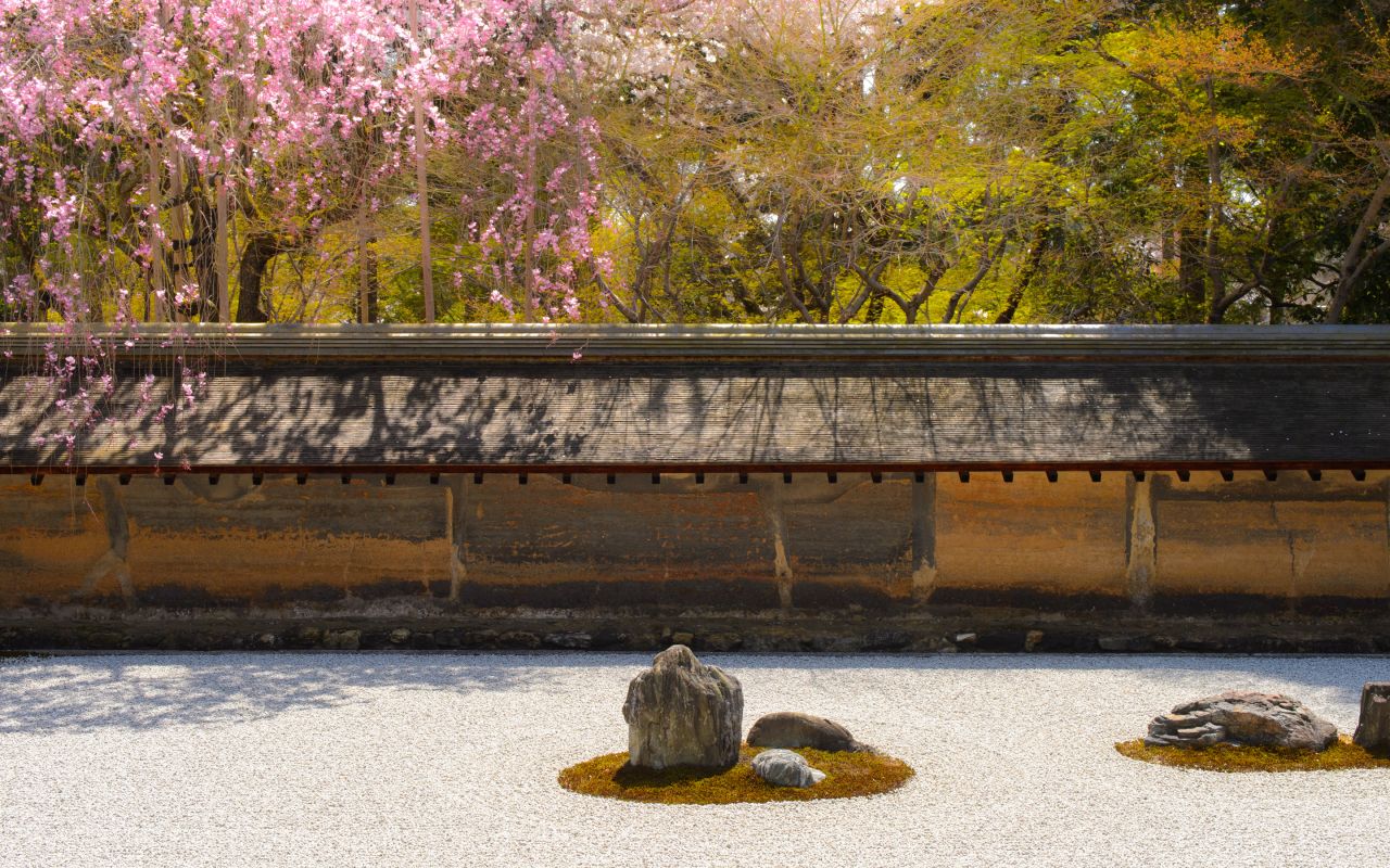 The simple design at Ryoan-ji's zen garden inspires thousands of interpretations.