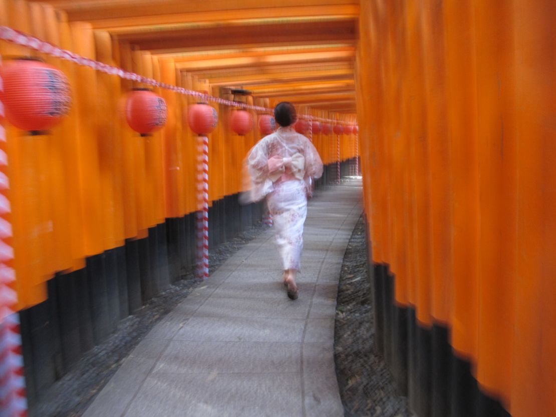 A typical shot in the vermilion tunnels of Fushimi Inari Taisha Shrine.