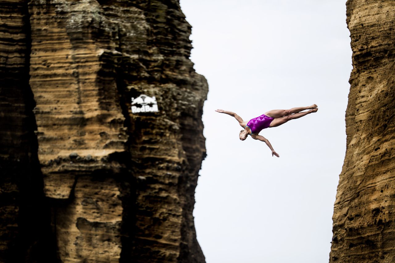 USA's Cesilie Carlton, who was crowned the first world champion of high diving in 2013, plunges into the waters of Vila Franca do Campo on July 18.