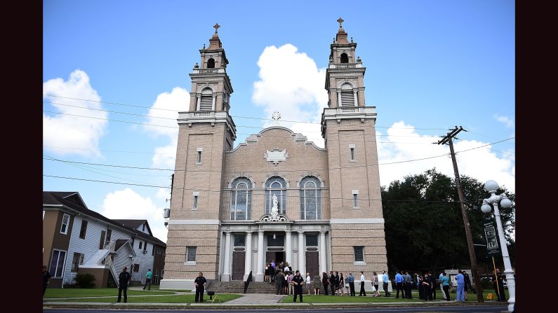 Two people were killed and nine wounded on July 23 when John Russell Houser opened fire in a theater before killing himself, according to police. This is the Church of the Assumption before the funeral of Mayci Breaux, on Monday, July 27, in Franklin, Louisiana. Click through the gallery for more photos from the funerals: