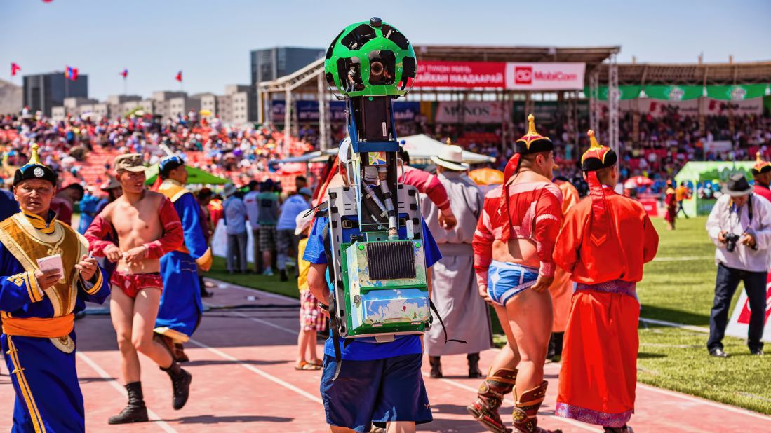 Google Trekker captures Mongolian wrestlers ahead of their competition. The Trekker comprises 15 individual fixed-focus lenses capable of taking 360-degree panoramic shots.