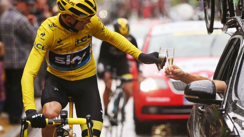 Chris Froome celebrates <a href="index.php?page=&url=http%3A%2F%2Fwww.cnn.com%2F2015%2F07%2F26%2Fsport%2Fcycling-tour-de-france-froome-greipel%2F" target="_blank">his Tour de France win</a> with a glass of champagne Sunday, July 26, in Paris. It was the second Tour de France title for Froome, who also won the race in 2013.