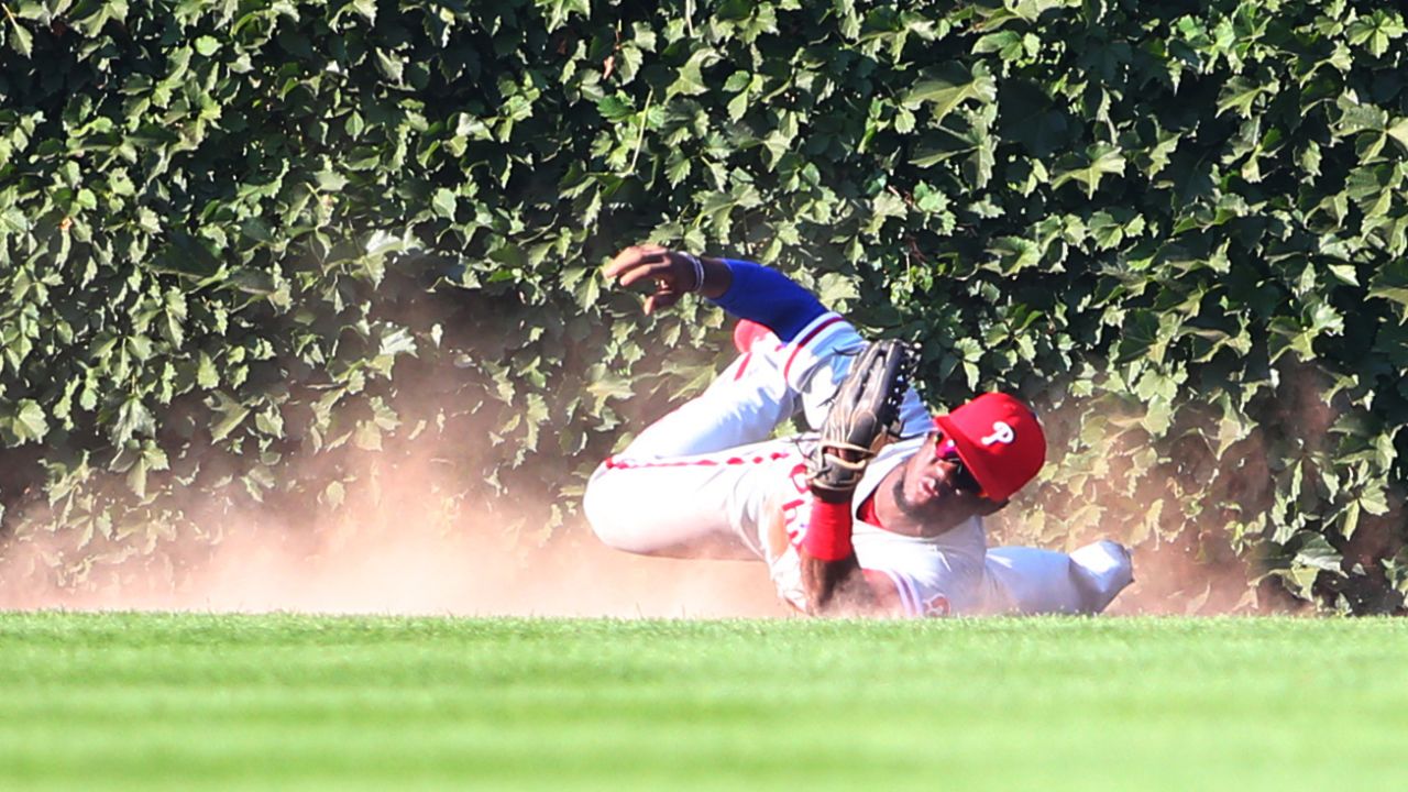 Philadelphia outfielder Odubel Herrera makes a diving catch to clinch a no-hitter for teammate Cole Hamels on Saturday, July 25. Hamels shut out the Chicago Cubs 5-0. It was his first career no-hitter.