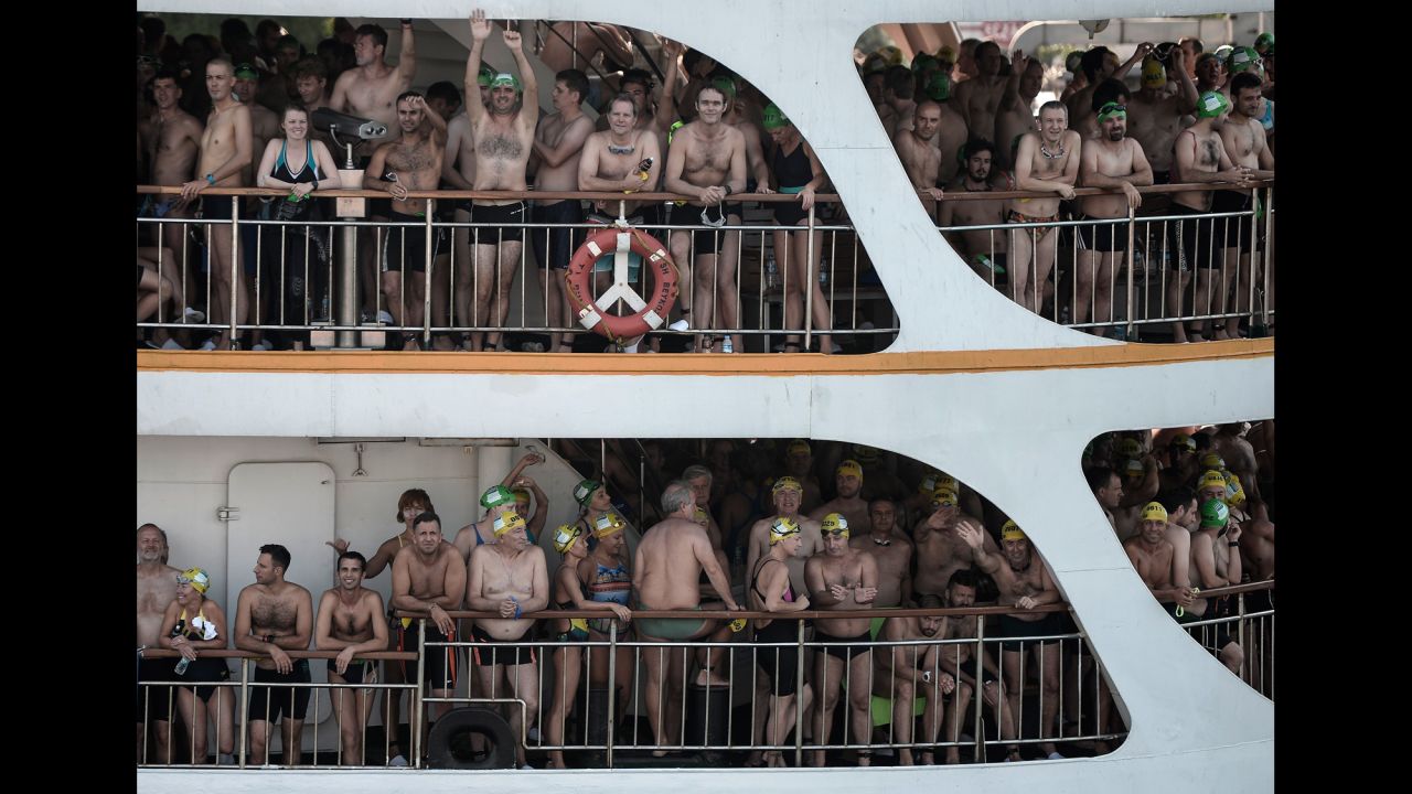 Swimmers wait at the Kanlica Ferry Port in Istanbul for the start of the 27th annual Bosphorus Cross-Continental Swimming Race on Sunday, July 26. During the race, competitors swim across the Bosphorus strait from Asia to Europe.