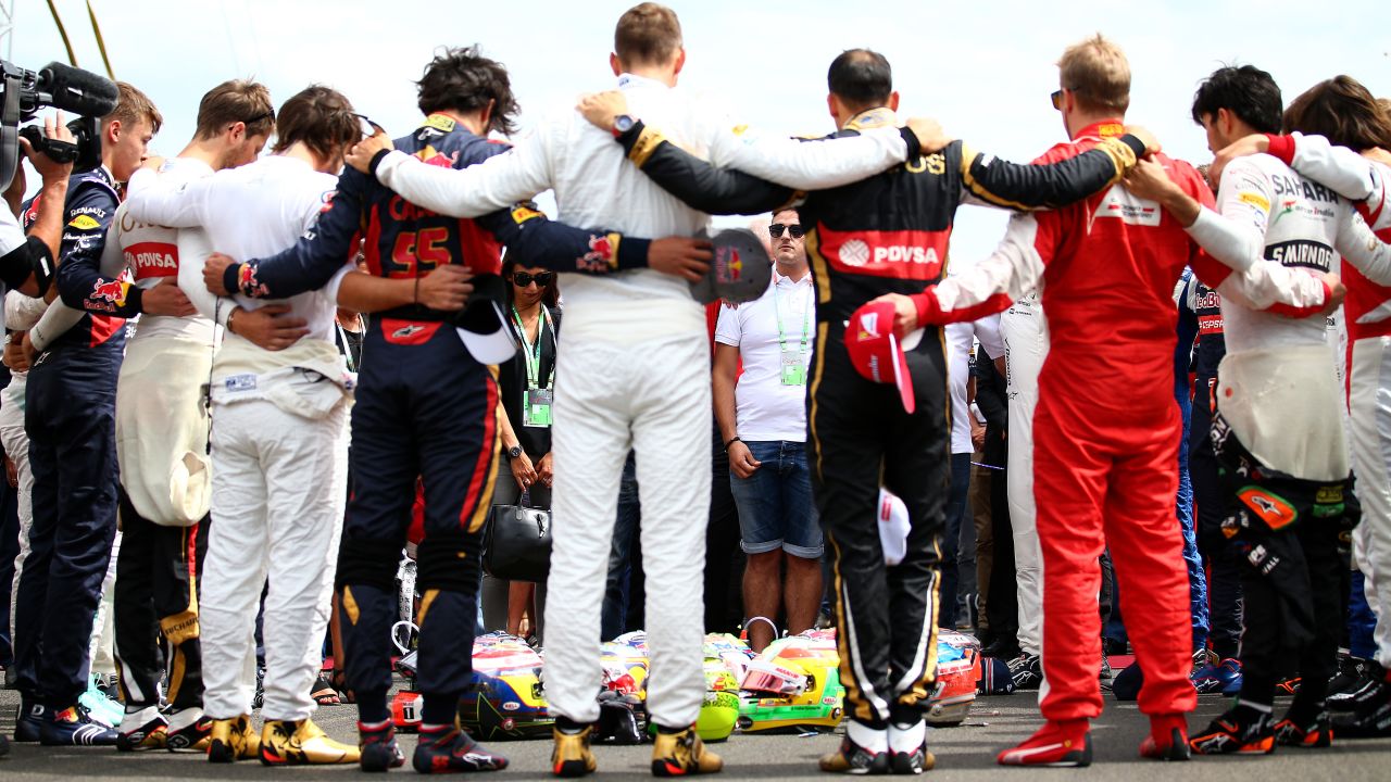 Formula One drivers and members of Jules Bianchi's family observe a moment of silence for Bianchi before the Grand Prix of Hungary on Sunday, July 26. Bianchi, an F1 racer from France, <a href="http://www.cnn.com/2015/07/18/motorsport/formula-one-jules-bianchi-dies/" target="_blank">died July 17</a> from the head injuries he suffered nine months ago in the Japanese Grand Prix. Bianchi was 25.