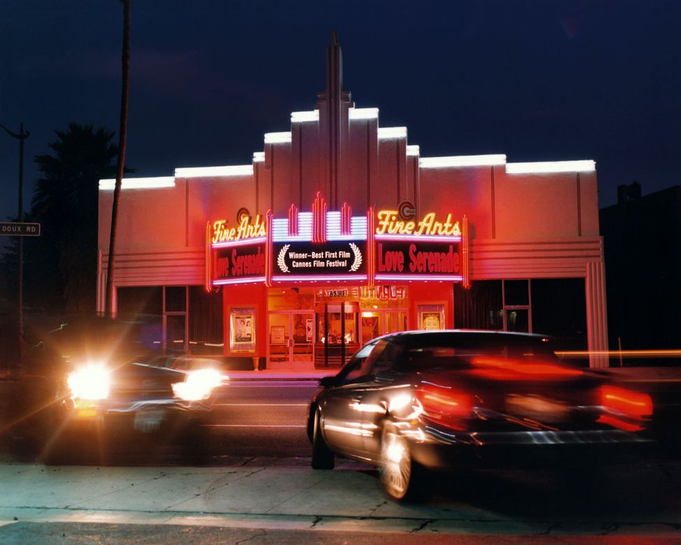 When it first opened in 1937, this theater showed "That Girl From Paris" and "Black Legion." <br />The glittering exterior of theaters like these inspired Klavens' project -- "I love standing outside at dusk and watching the light change," she says. <br />"As daylight fades and the electric street lights and neon marquees become more prominent it totally changes the scene, and I enjoy the shifting light and shooting just at the 'magic hour.' <br />"I'm also fascinated by the many decorative details in the interiors, and how different it was in that era, compared to the approach to the design of public spaces today."  