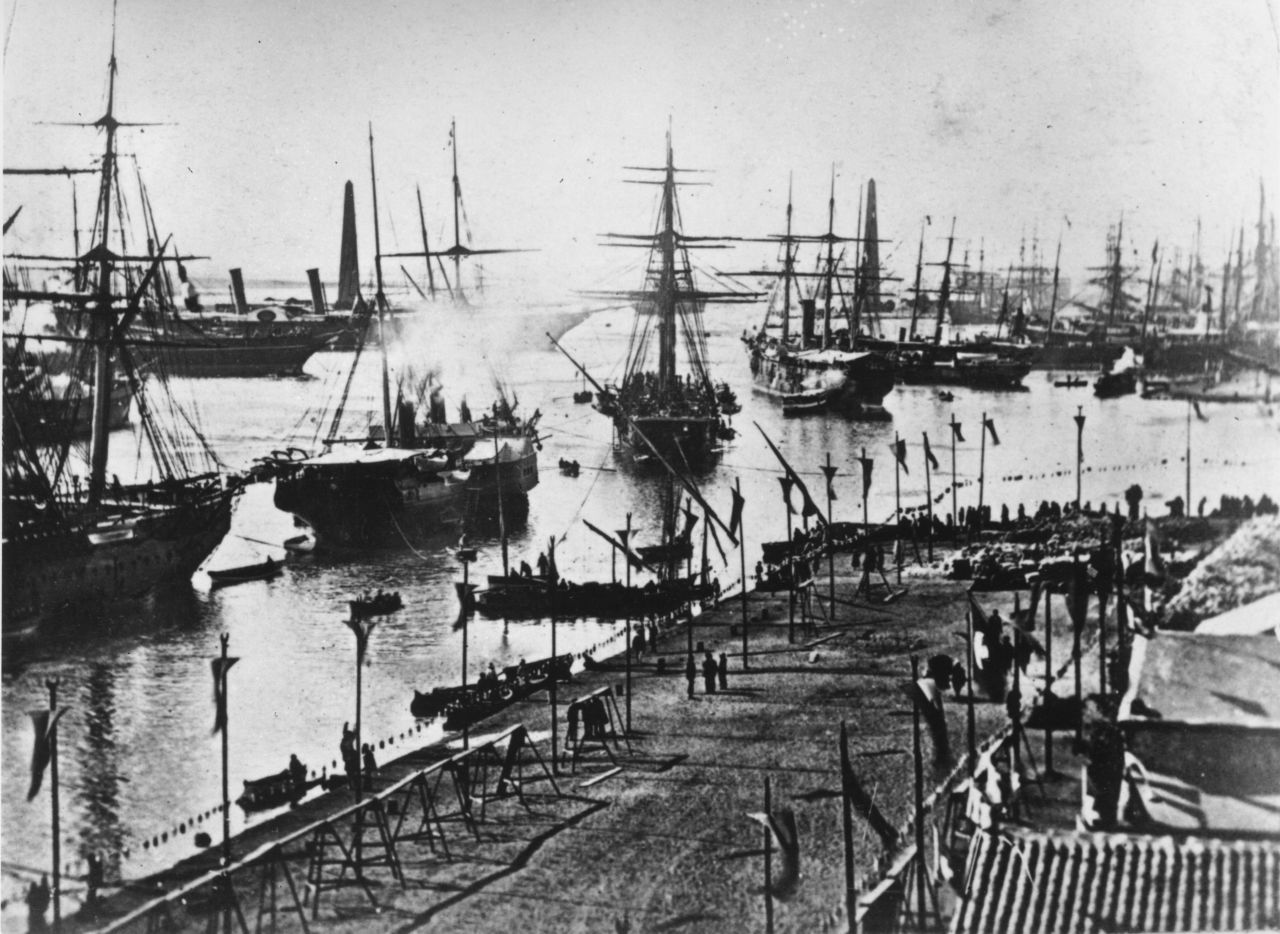 A fleet of ships enter the Suez Canal at its inauguration on November 17, 1869. Egypt was the first recorded country to dig a man-made canal across its land for international trade. Connecting the Mediterranean Sea to the Red Sea via the Nile, the Suez Canal is the shortest route between the east and the west.