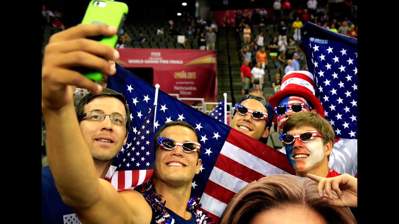 U.S. fans take a photo together on Saturday, July 25, as they attend the Volleyball World Grand Prix in Omaha, Nebraska.