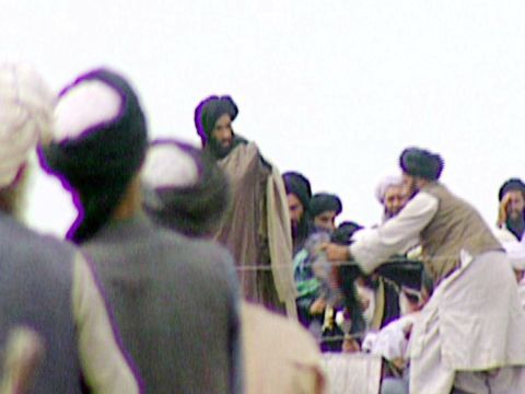 In this image taken off television by BBC Newsnight, Omar -- fourth from left -- attends a rally with Taliban troops before their victorious assault on Afghanistan's capital, Kabul, in 1996. The Taliban's aim is to impose its interpretation of Islamic law on Afghanistan and remove foreign influence from the country. Most of its members are Pashtun, the largest ethnic group in Afghanistan.