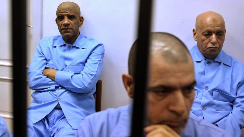 Former Libyan spy chief Abdullah al-Senussi, left, attends his trial in Tripoli, Libya, on Tuesday, July 28. A Libyan court <a href="http://www.cnn.com/2015/07/28/africa/libya-saif-al-islam-gadhafi-sentence/" target="_blank">handed out death sentences</a> to al-Senussi and several other officials from the former regime of Moammar Gadhafi. 