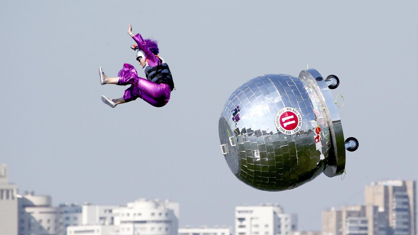 A participant falls during the Red Bull "Flugtag" event in Moscow on Sunday, July 26. In Flugtag, which means "flying day" in German, everyday people pilot homemade gliders off a 30-foot deck and into water -- in this case, the Moskva River. The contestants are judged not only on their distance, but their creativity and showmanship. 