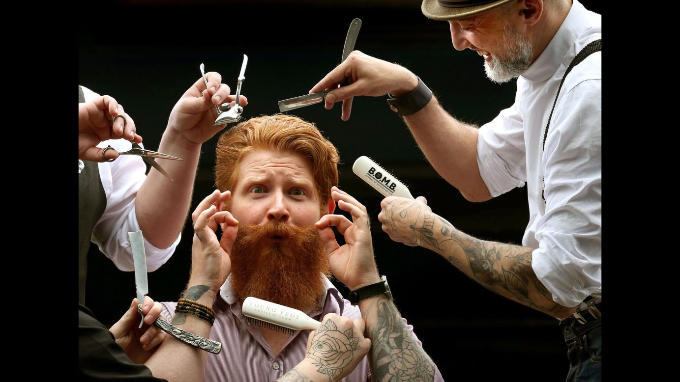 Chris Moriarty has his beard prepared on Friday, July 24, ahead of the Great British Barber Bash in Glasgow, Scotland. Scotland's best barbers came together to demonstrate their flair for hair, beards and mustaches.