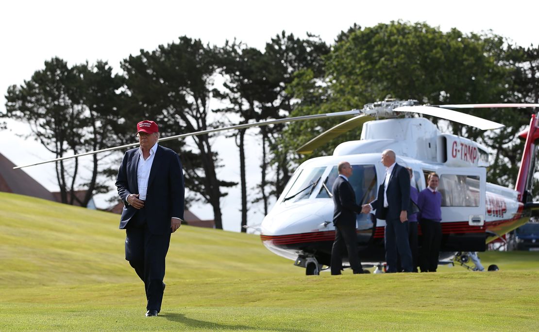 Republican Presidential Candidate Donald Trump arrives by helicopter to visit his Scottish golf course Turnberry on July 30, 2015 in Ayr, Scotland.