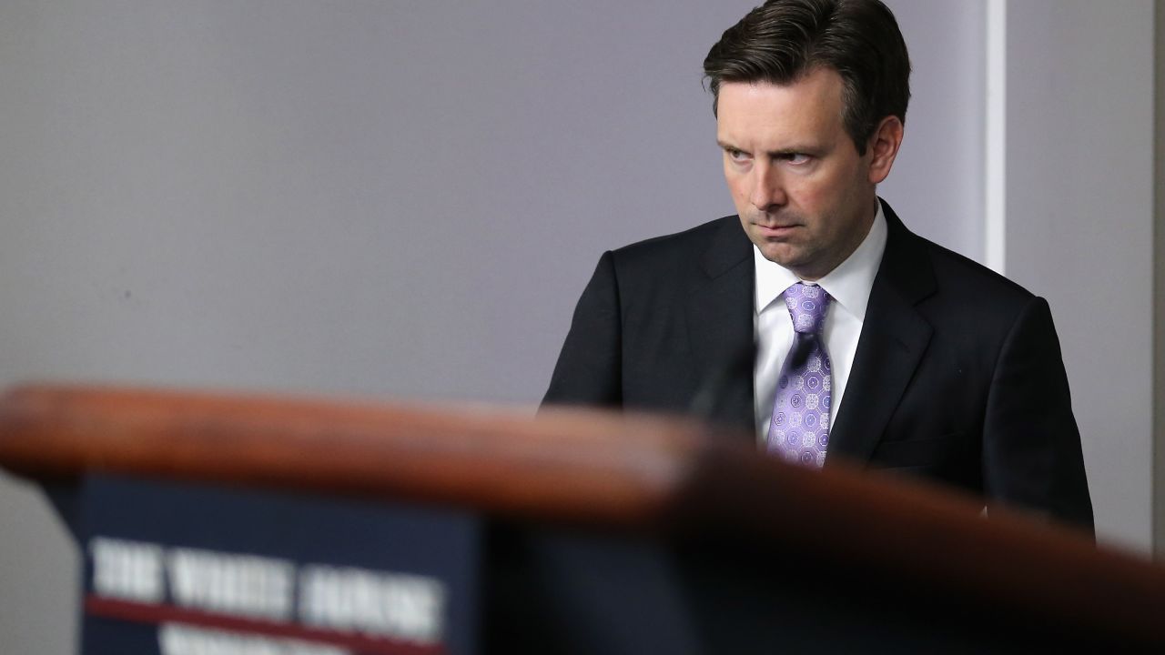 White House Press Secretary Josh Earnest arrives for the daily news briefing at the White House July 8, 2015 in Washington, D.C.
