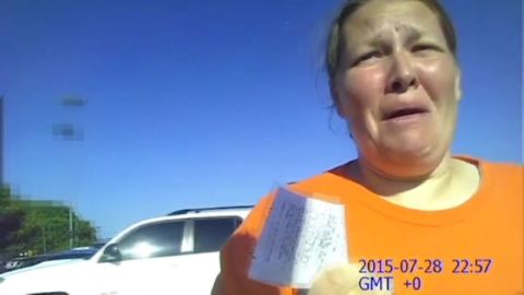 Mother reaction baby in hot car body cam pkg_00001318.jpg