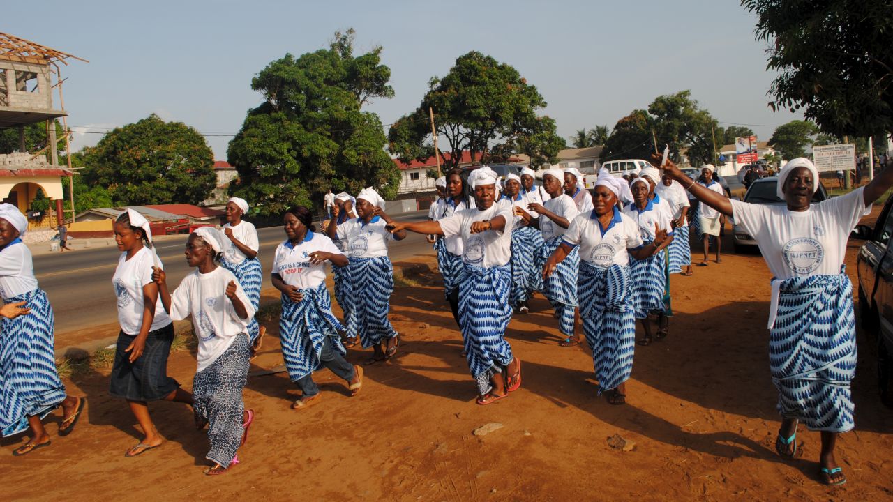 Women in Monrovia celebrate after the World Health Organization declared Liberia Ebola-free on May 9, 2015. Other cases have recurred since, however. Two people in Liberia have died of the disease since the end of June, just weeks after the WHO declared the nation free of the disease. 