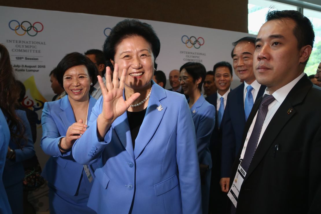 Liu Yandong, head of the Beijing 2022 Delegation, waves after placing her city's bid for 2022. 