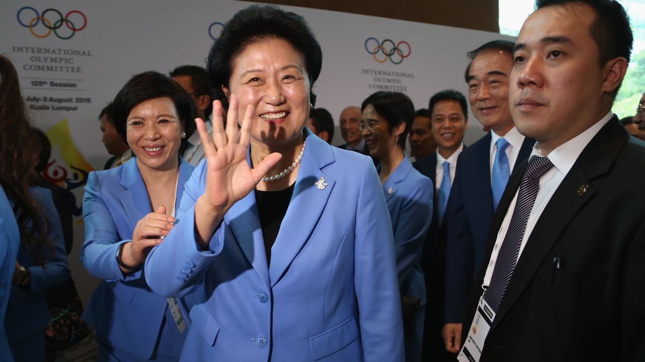 Liu Yandong, head of the Beijing 2022 Delegation, waves after placing her city's bid for 2022.
