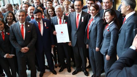 Kazakhstan's Prime Minister, Minister of Foreign Affairs, and President of the National Olympic Committee are pictured with bid committee members presenting their bid.