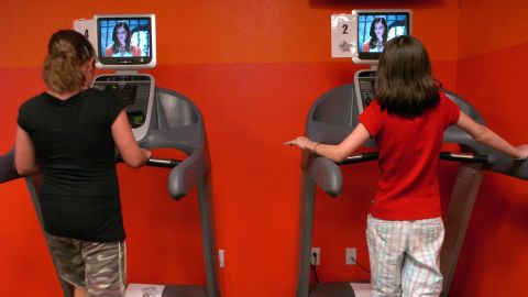 To make it easier to stay off the couch, some people have a treadmill, exercise bike or a stair stepper in front of the TV.