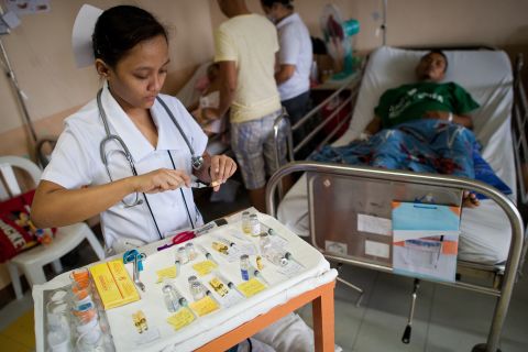 There is no drug for dengue. Patients must be monitored carefully for the onset of the severe form of dengue. Pictured, a nurse looks after a patient with dengue at a hospital in Manila, Philippines.