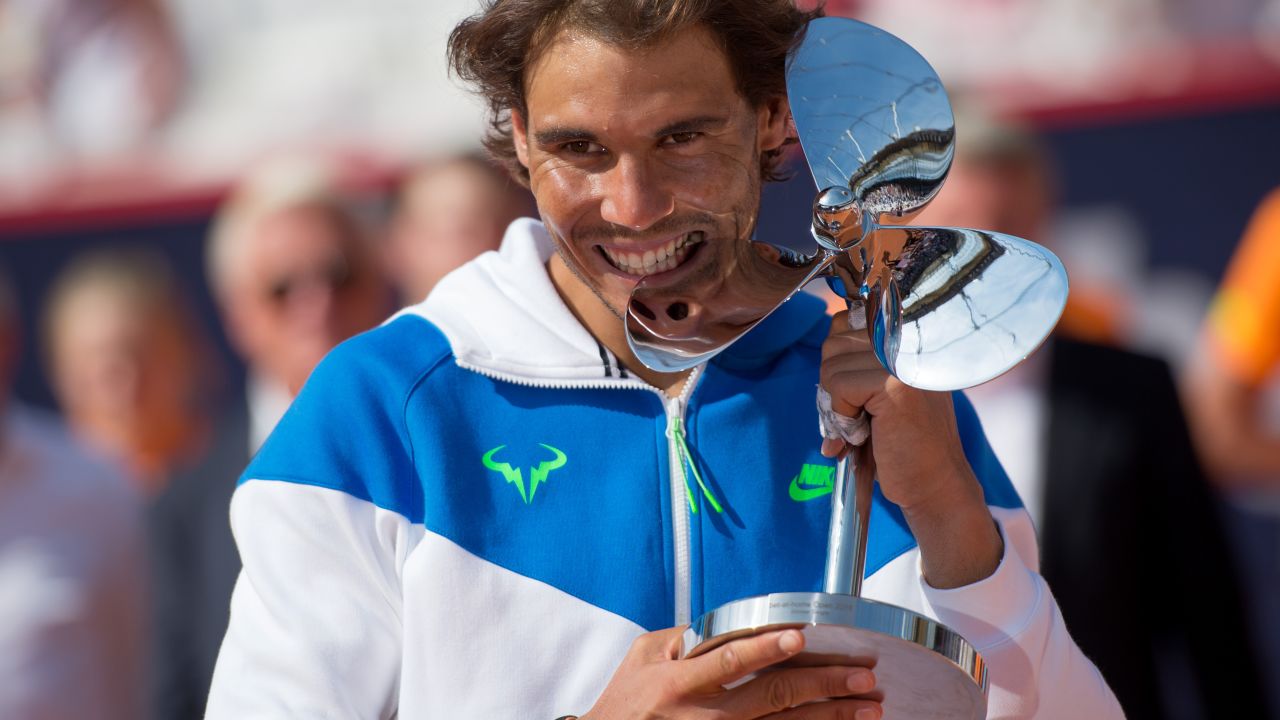 Rafael Nadal cuts a typical pose after claiming the Hamburg title with a straights sets win over Fabio Fognini.