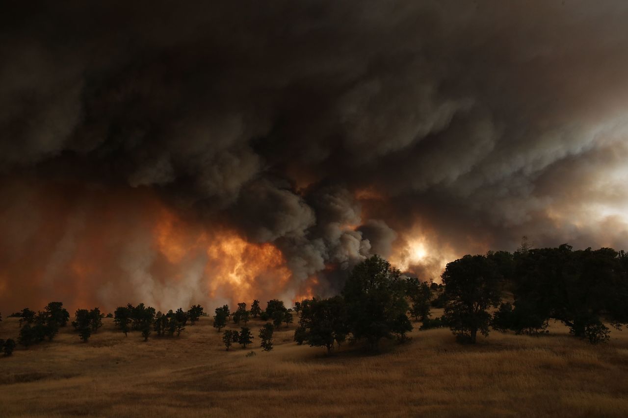 Large plumes of smoke rise from the Rocky Fire on Saturday, August 1.